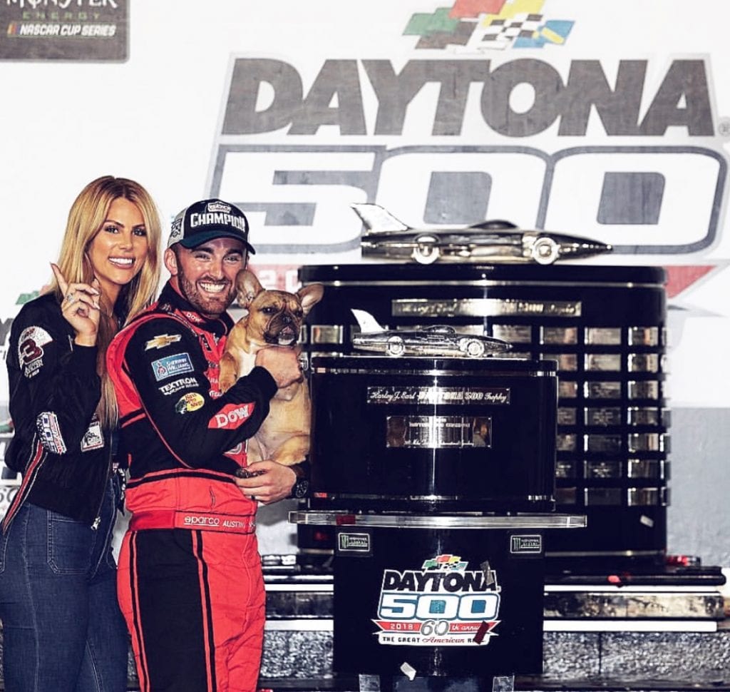 austin dillion at daytona 500 with his french bulldog puppy